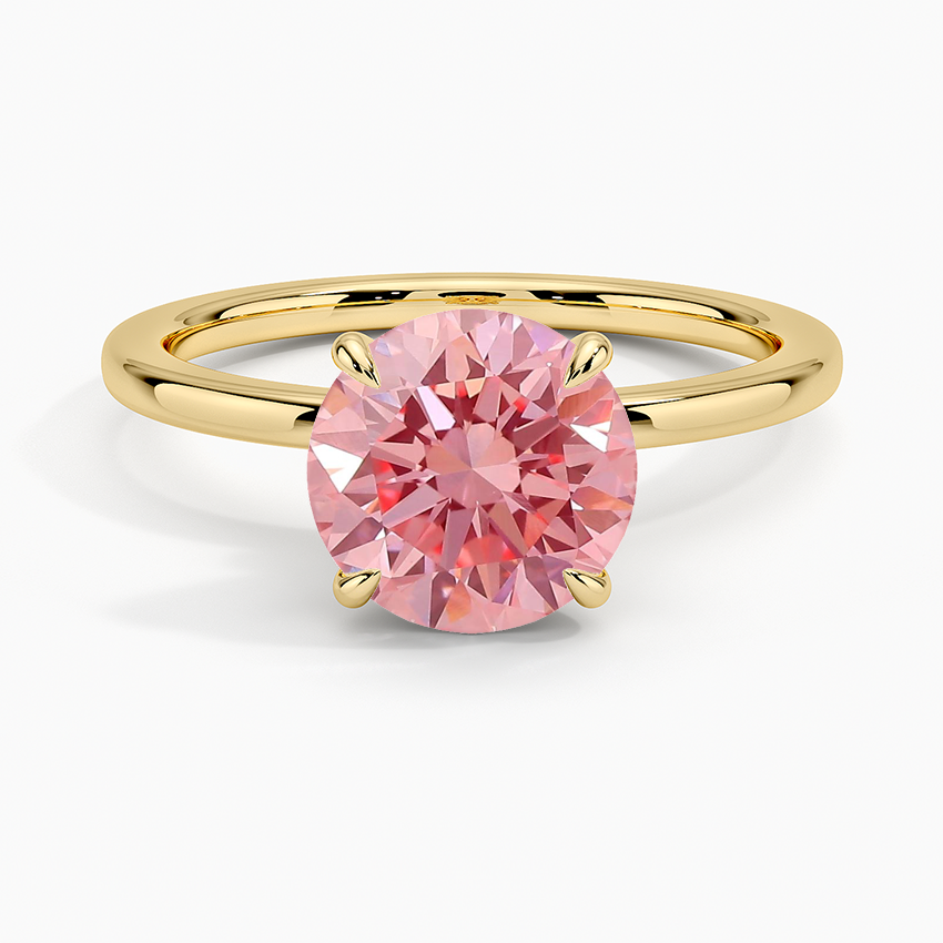 Pink lab-grown diamond ring with colorless side diamonds