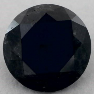 Round mined black diamond photographed face-up