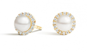 White cultured pearls framed by small diamonds in yellow-gold halo stud settings