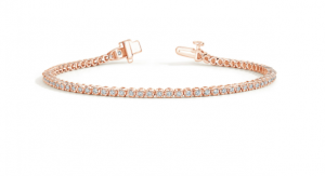 Fine rose-gold tennis bracelet with small round diamonds and a safety clasp