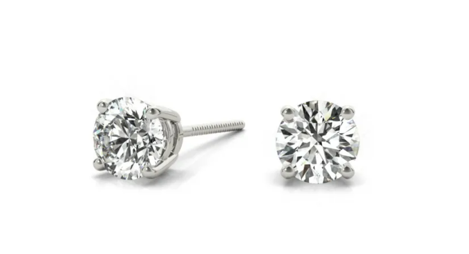 Round diamonds in white-metal four-prong basket stud settings