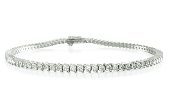 White-metal round diamond tennis bracelet with a safety clasp