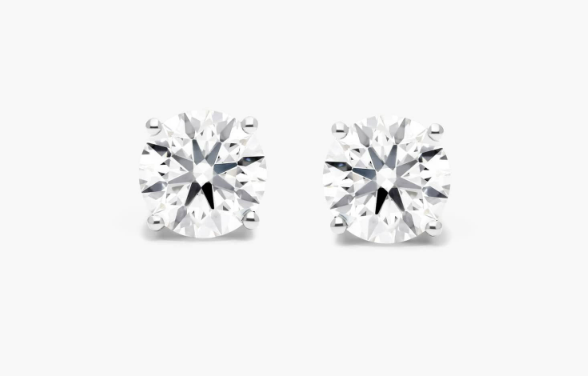 Round diamond stud earrings in white-metal four-prong settings