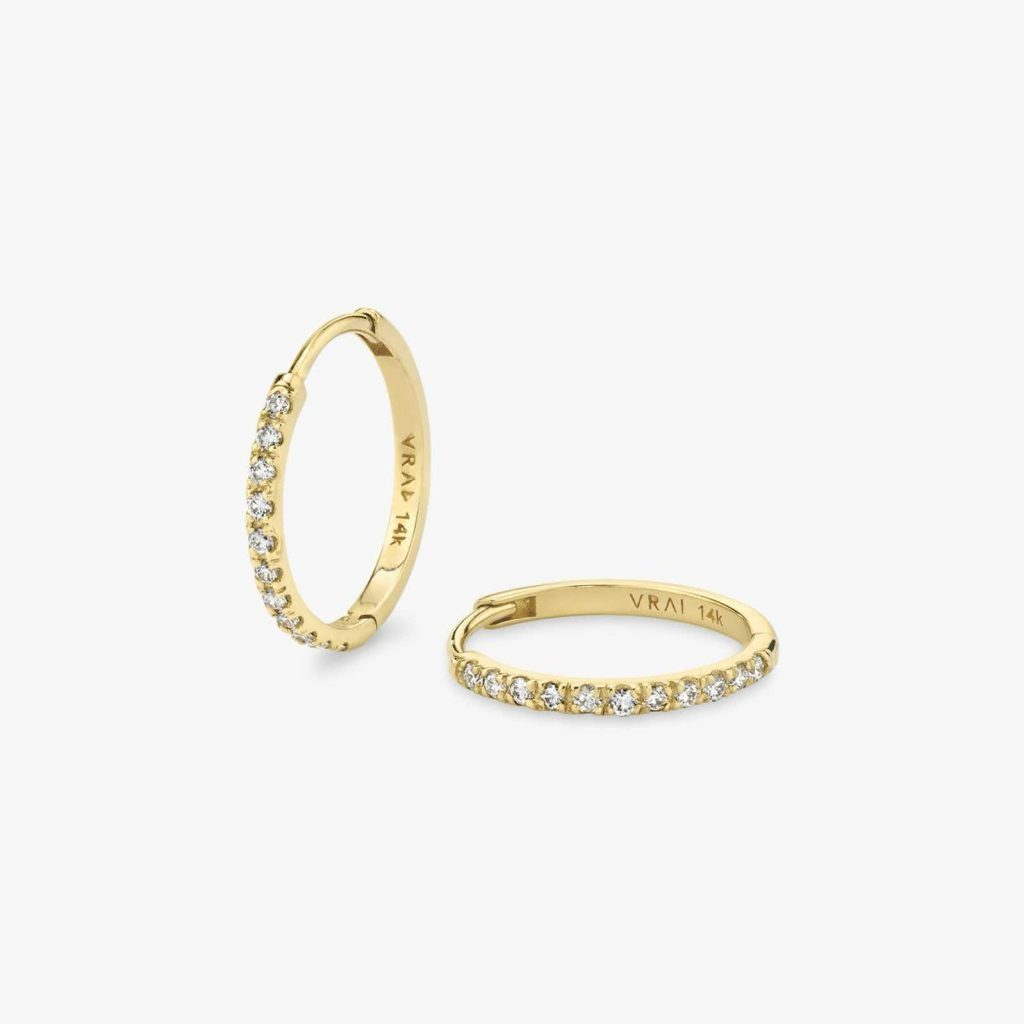 Yellow-gold hoops set with a row of round diamonds