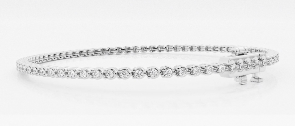 White-metal tennis bracelet with a continuous line of round diamonds