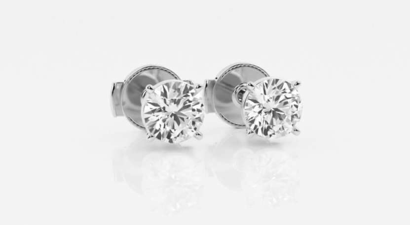 Round diamond stud earrings in white-metal prong settings