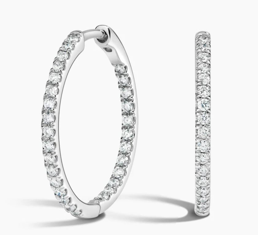 White-metal hoops with diamonds along their outer and inner front edges