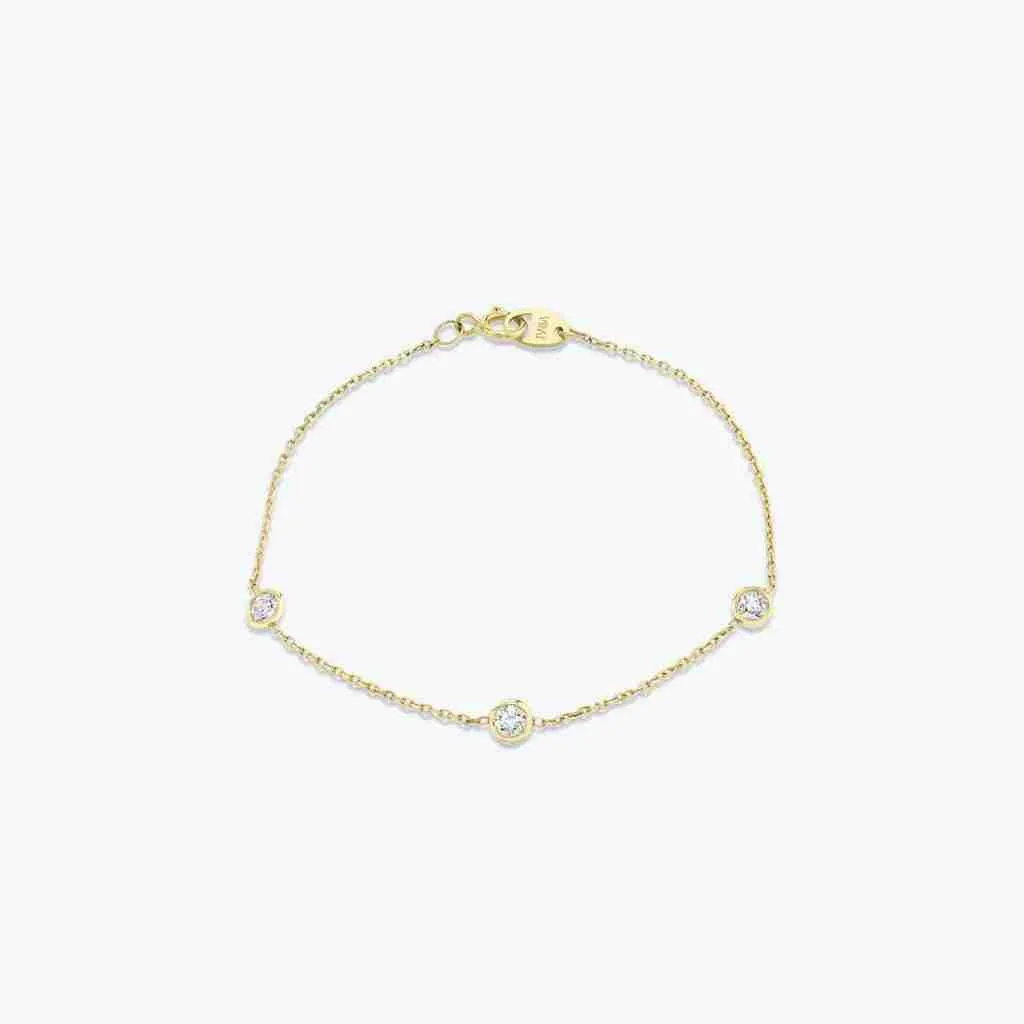 Fine yellow-gold chain bracelet with three round diamonds in smooth bezels
