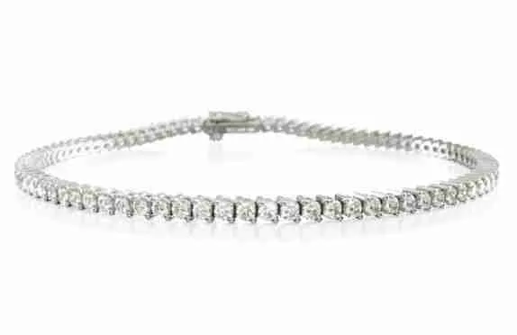 White-metal tennis bracelet with a continuous line of round diamonds and a safety clasp