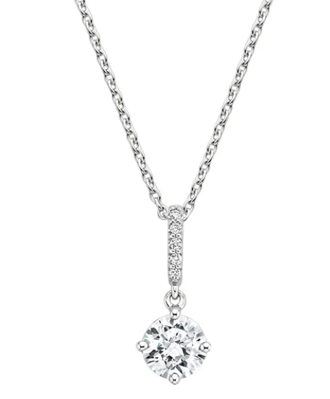 Round diamond suspended below a diamond-set bar with prongs at compass points
