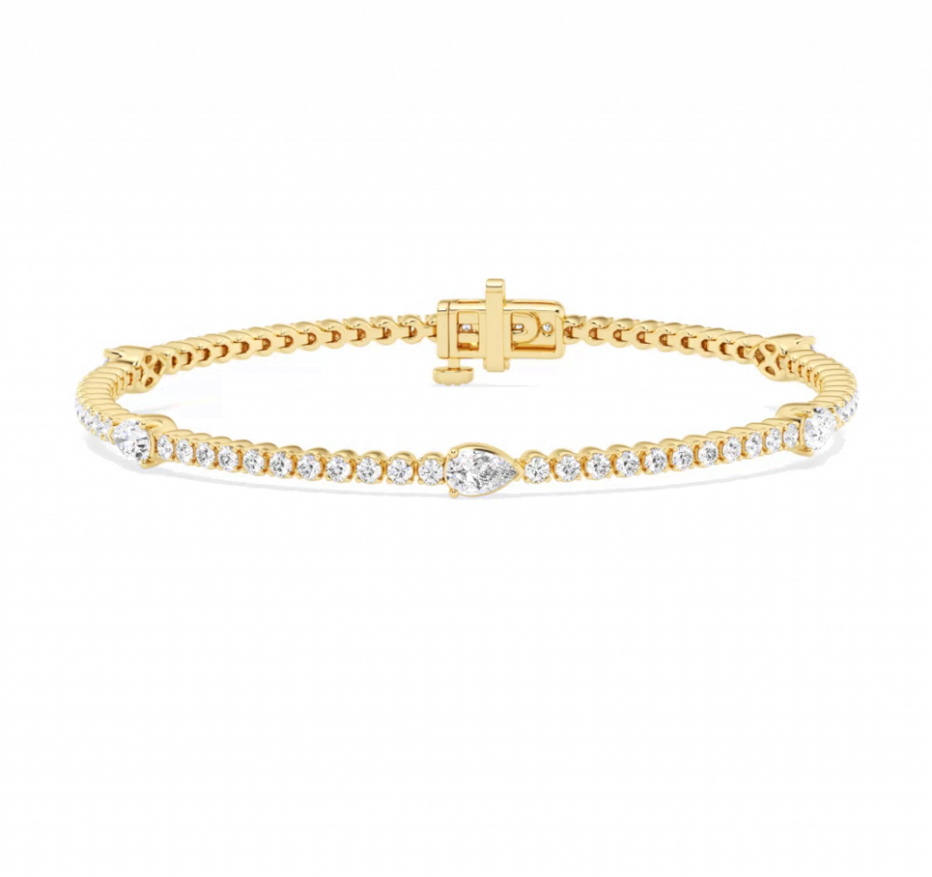 Yellow-gold diamond bracelet with five larger pear-shaped stations