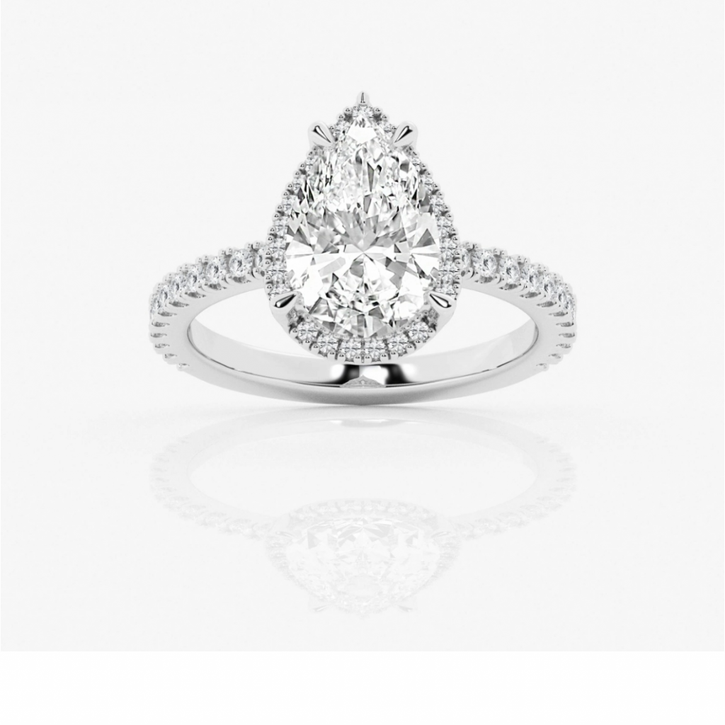Pear-shaped diamond surrounded by a halo on a diamond-set band