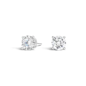 Pair of round diamond stud earrings in white-metal prong settings