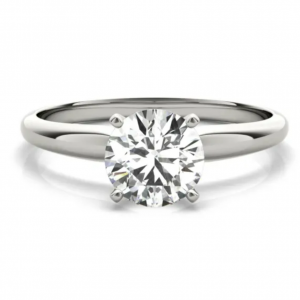 Round center stone in a simple white-metal solitaire ring