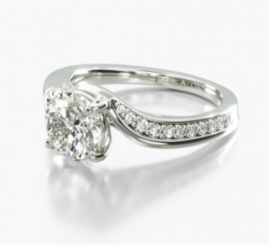 Round center diamond framed by an overlapping diamond-set white-metal band