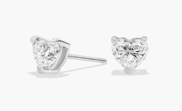 Two heart-cut diamonds in white-metal stud settings