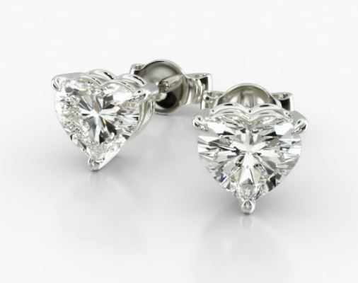 Heart-cut diamond studs in white-metal prong settings with push backs
