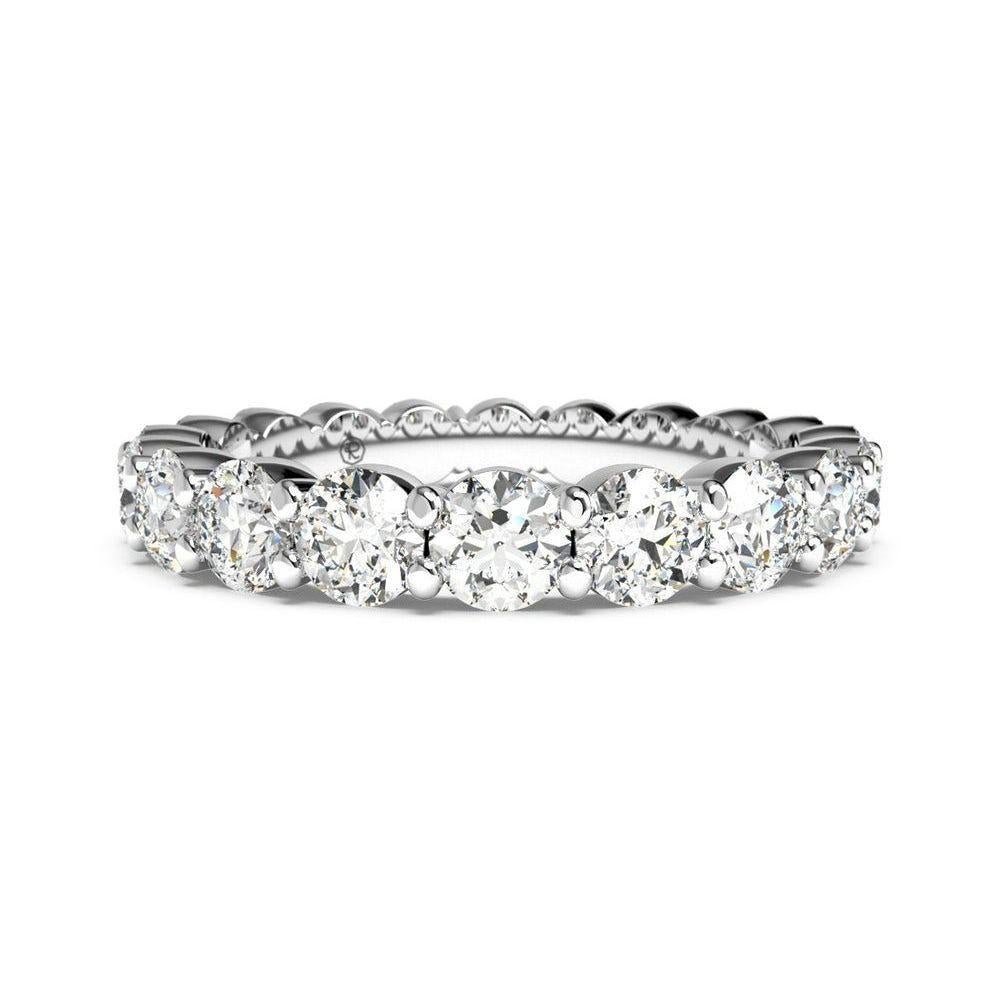 Full eternity band of round diamonds in shared white-metal prongs