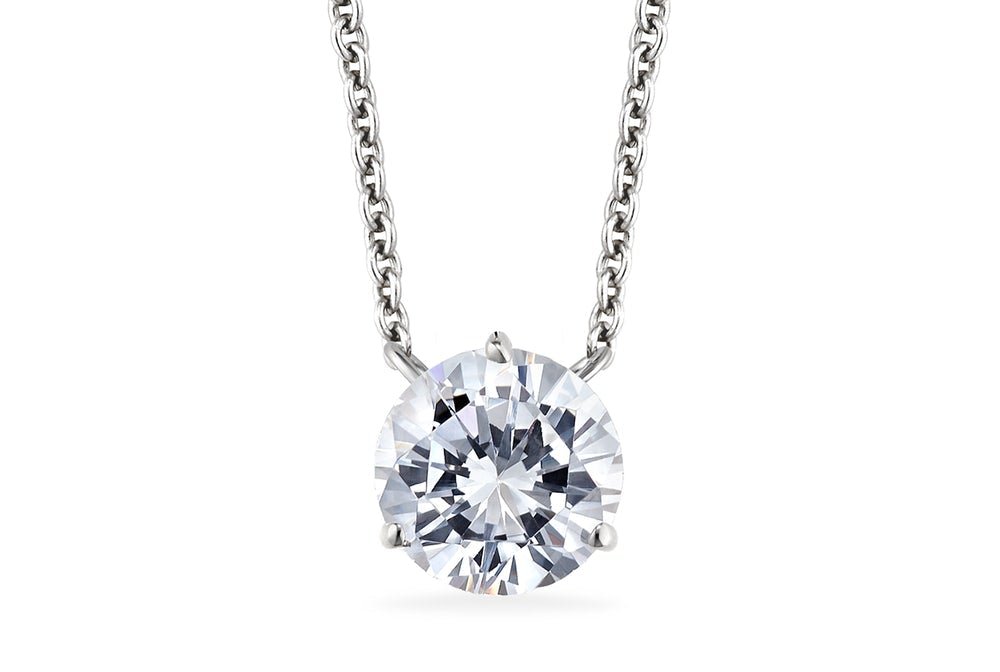 Round colorless diamond solitaire pendant on a white-metal chain