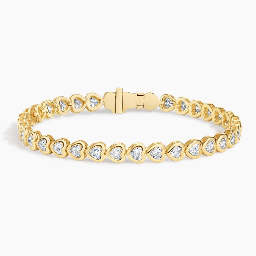 Brilliant Earth yellow-gold tennis bracelet with sideways heart-shaped diamonds in full bezel settings