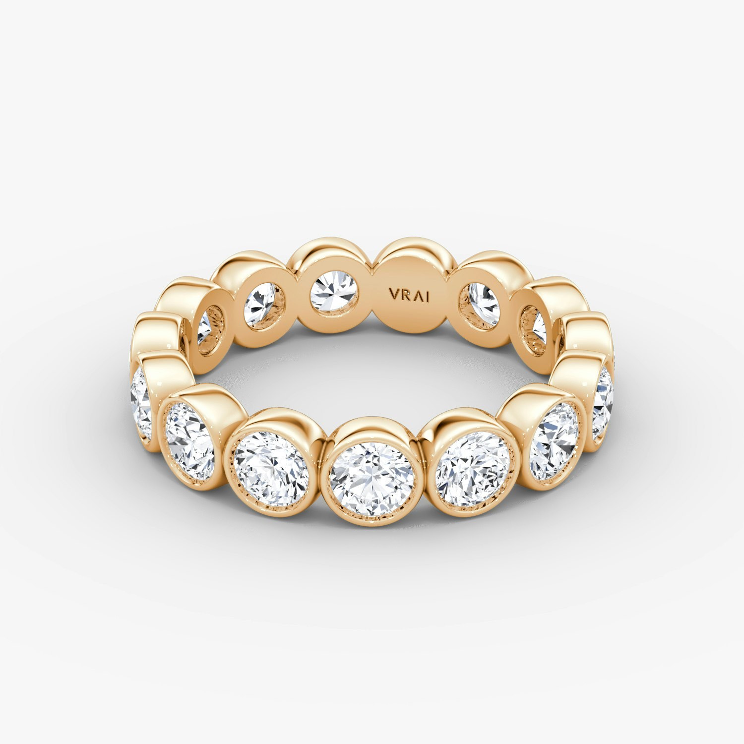 Round bezel lab-grown diamond eternity band in rose gold