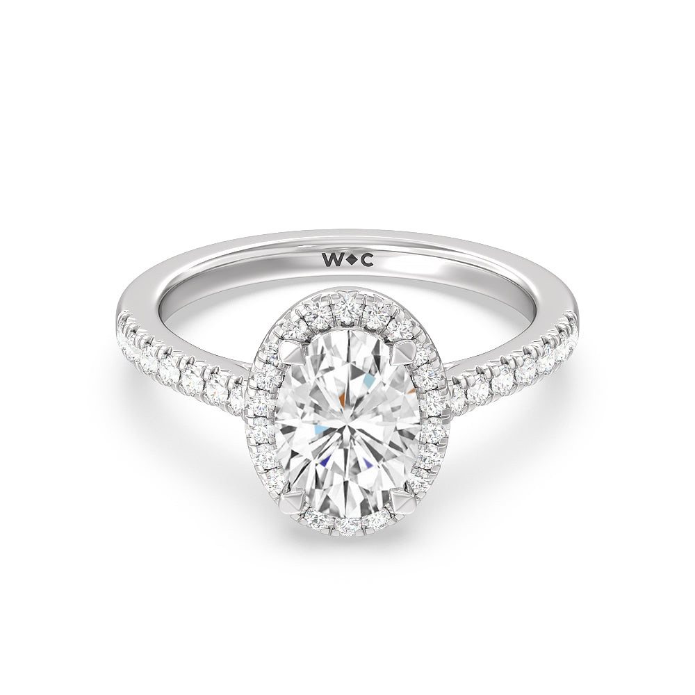 Oval lab-grown diamond halo engagement ring in white gold