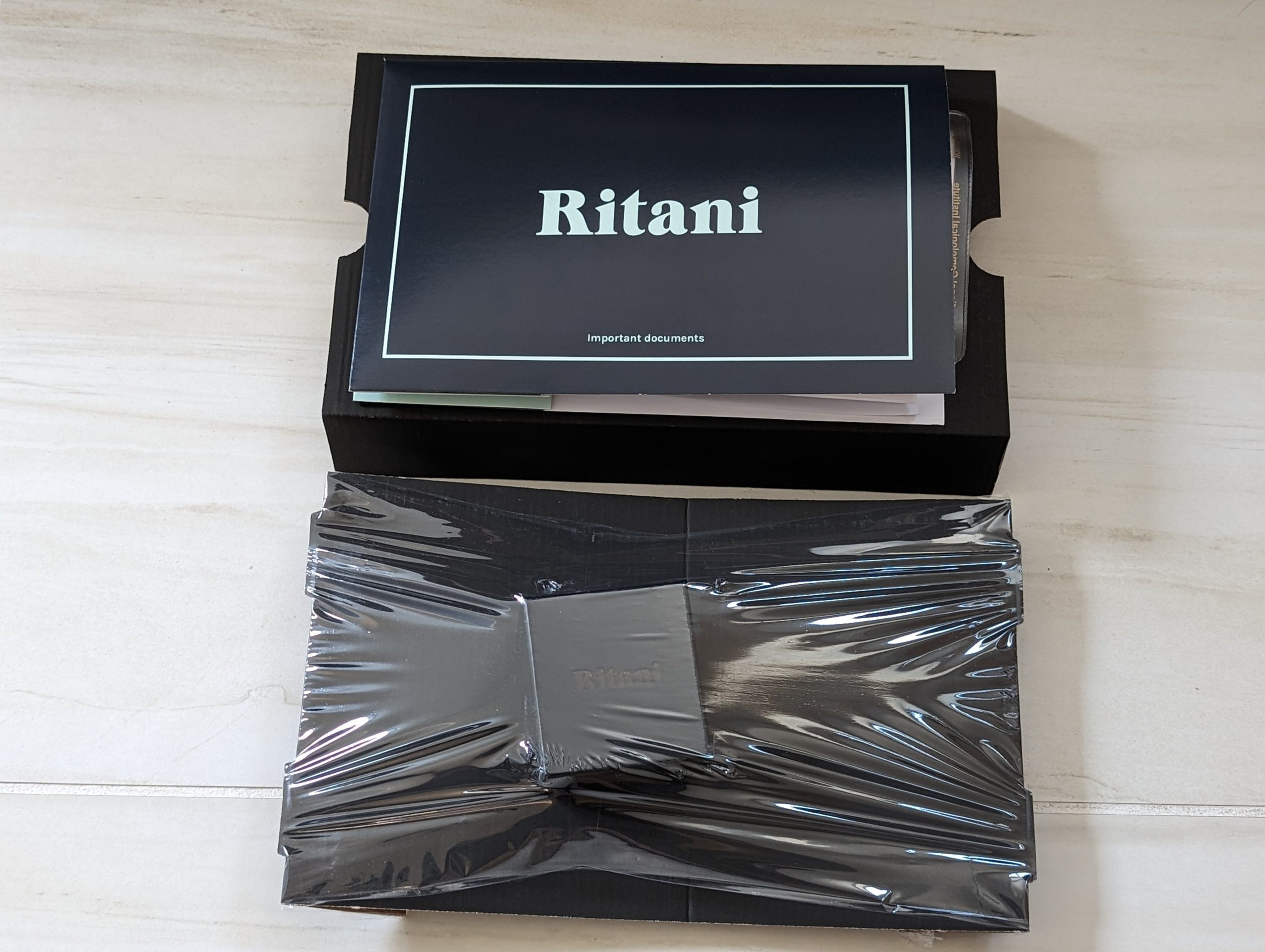 Ritani shipping box, document wallet, and protective ring packaging