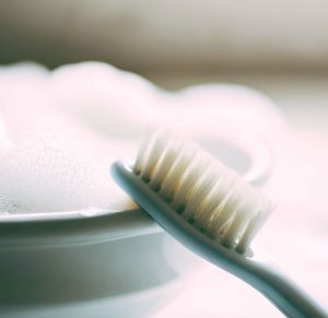 Lab-Grown Diamond Care and Cleaning - toothbrush and soapy water.