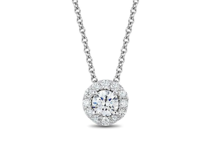 Lab-created diamond halo pendant.