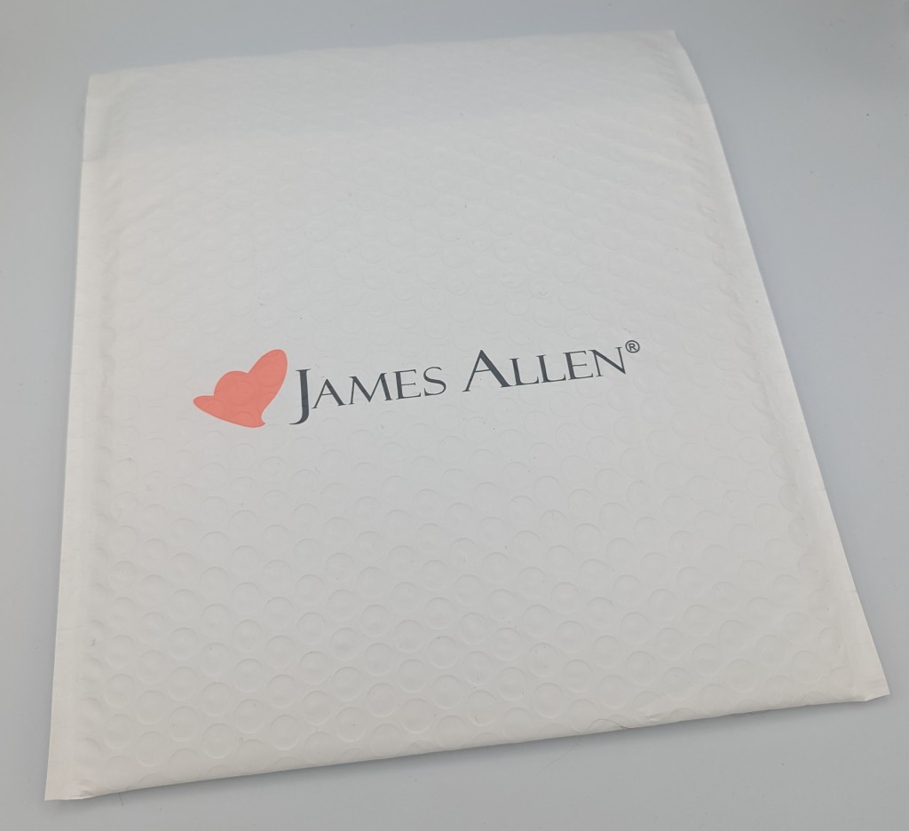 James Allen return packaging with prepaid shipping label for sending back lab-grown diamonds or jewelry.