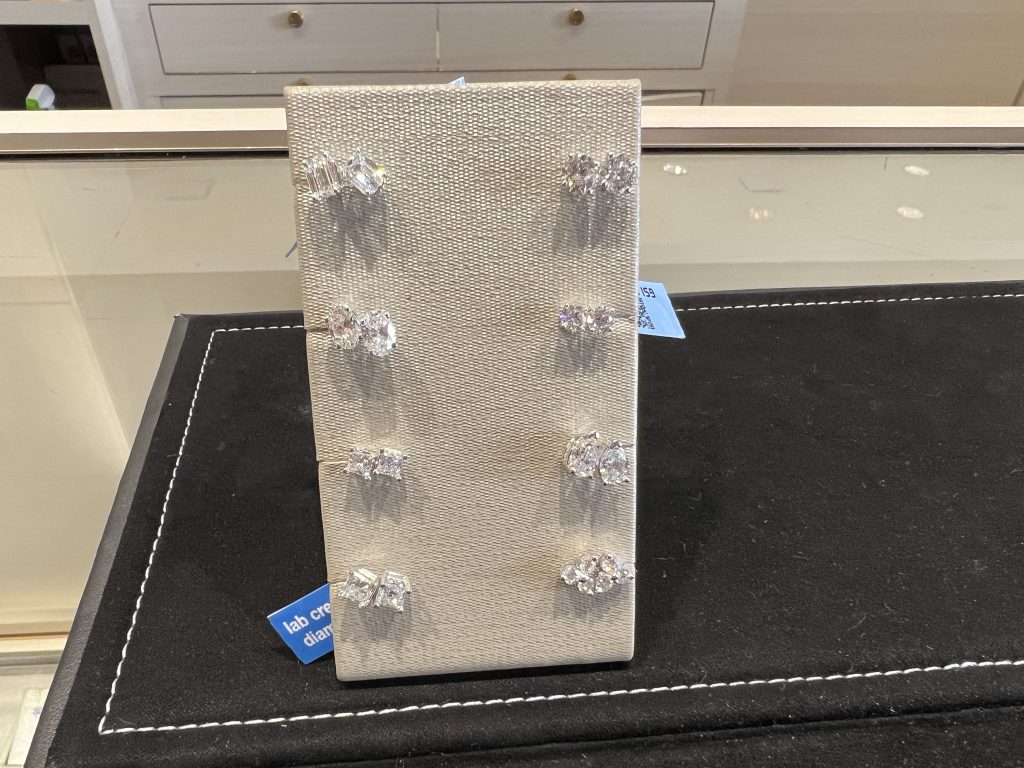 Dull and lifeless lab-created diamond earrings from Kay Jewelers.