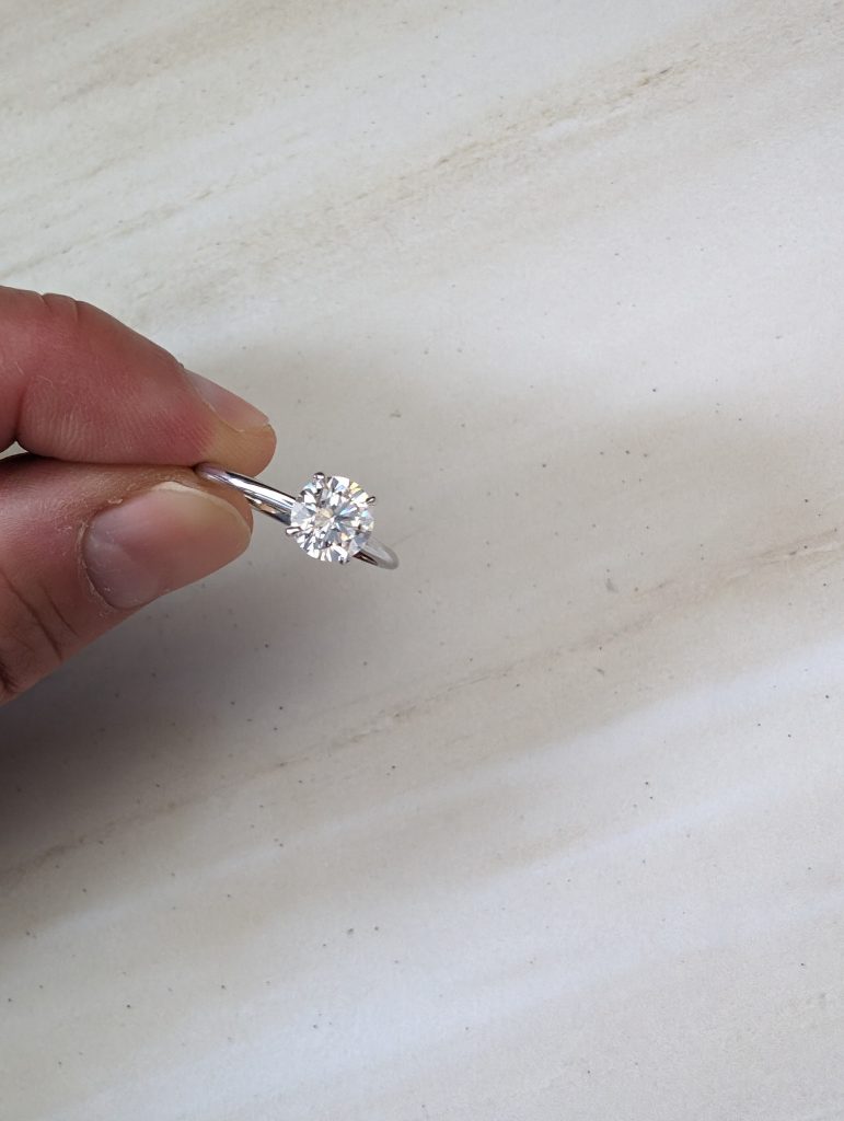 The diamond ring that we bought cost less than $1000 at Ritani.